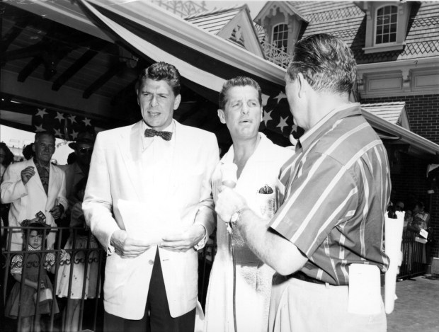 Ronald Reagan, alongside fellow co-hosts Bob Cummings and Art Linkletter at Disneyland's Opening Day on July 17, 1955. (Photo courtesy of: The Walt Disney Archives)