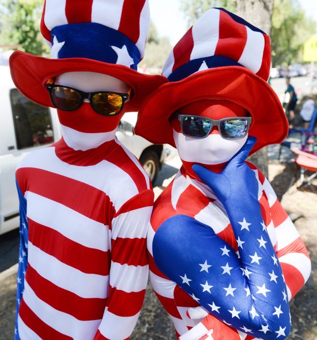 Evan Larson 12, (left), and his brother Kyle, 10, of Redlands, poses for a photo before the start of the annual Redlands 4th of July Parade in Redlands, Ca., The city will once again host a parade and holiday festivities this year. (Photo by John Valenzuela/Redlands Daily Facts)