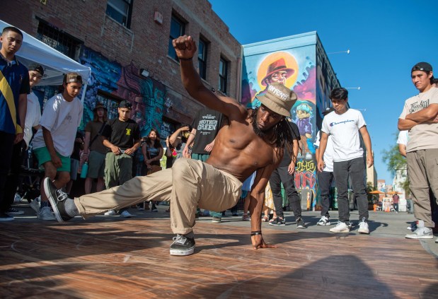 In this Aug. 2021 file photo, Stephen "Iggi" Igwe of North Hollywood takes a turn on the breakdancing floor during the Downtown Santa Ana Artwalk. The artwalk event takes place on the first Saturday of every month. (File photo by Jeff Antenore, Contributing Photographer)