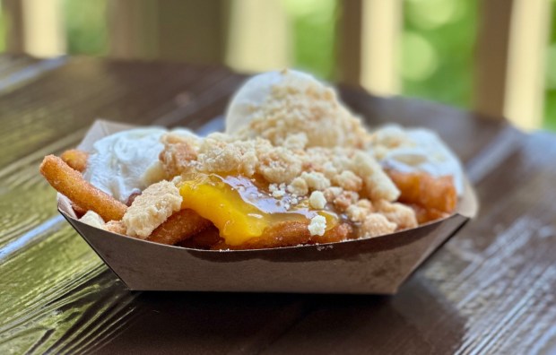 Peach Cobbler Funnel Cake Fries available at Hungry Bear Barbecue Jamboree during Disneyland's 70th anniversary celebration. (Brady MacDonald/Orange County Register/SCNG)