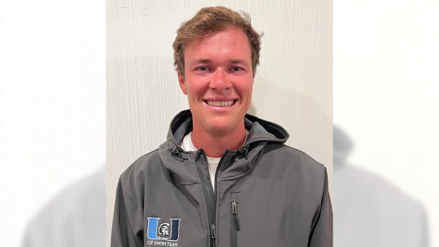University's Ryan Vande Wydeven is the Register's Orange County boys swimming coach of the year for 2025. He guided the Trojans to the Pacific Coast League title. (Courtesy Madison Vande Wydeven)