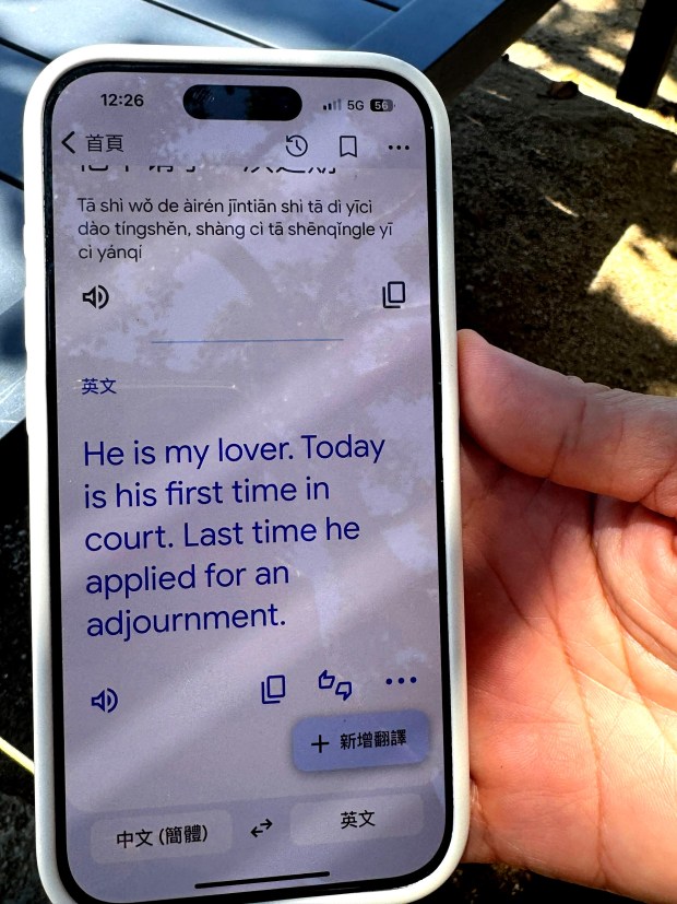 Layla, a 43-year-old Riverside woman and asylum seeker from China, told a reporter her boyfriend was taken by ICE that morning. (Photo by Mona Darwish)
