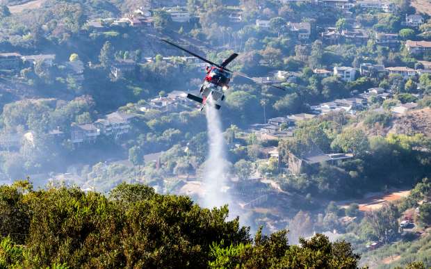 Firefighters battle the Rancho fire in Laguna Beach on Monday, July 7, 2025. (Photo by Paul Bersebach, Orange County Register/SCNG)
