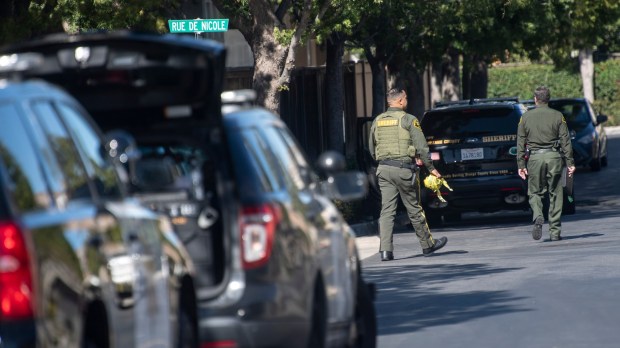 Sheriff deputies investigate the scene of a stabbing at a Lake Forest home on Tuesday, February 23, 2021. A man and a woman sustained serious but non-life-threatening injuries, said Sgt. Dennis Breckner. A suspect, who didn't live there, was later taken into custody at a nearby retail center. (Photo by Mindy Schauer, Orange County Register/SCNG)