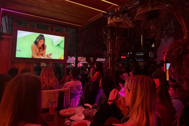 Fans watch contestant Amaya Espinal form connections on Love Island USA at Roosterfish in West Hollywood on Tuesday, June 24, hosted by Reality Bar. (Carolyn Burt, SCNG)