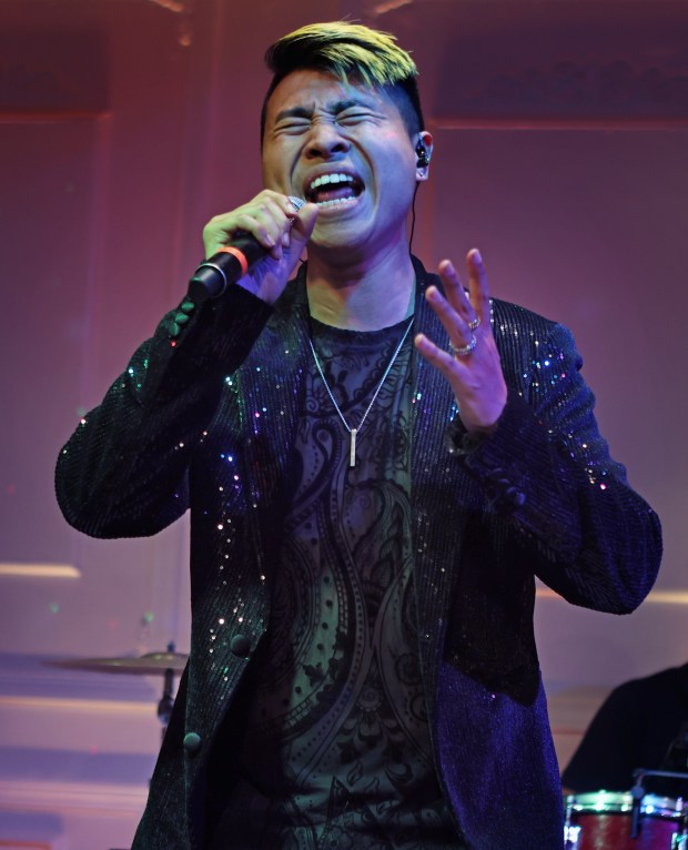 Duy Nguyen-Amigo performs at his parents' banquet hall, Mon Amour, in the city of Anaheim. (Photo by Karen Tapia, Contributing Photographer)