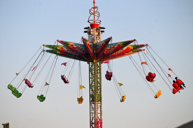 In this Friday, May 2, 2025, file photo, county fair guests ride the spinning chairs ride at the LA County Fair at the Pomona Fairplex. Memorial Day will be the fair's final day. (Photo by Anjali Sharif-Paul, The Sun/SCNG)