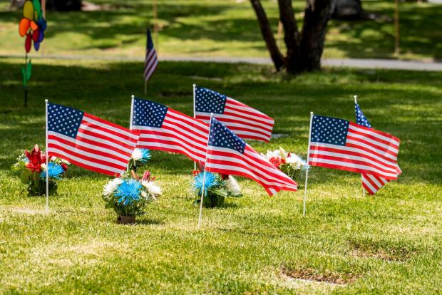 American flags are placed on gravesites for the Memorial Day  at Fairhaven Memorial Park & Mortuary in Santa Ana on Sunday, May 30, 2021. (Photo by Leonard Ortiz, Orange County Register/SCNG)