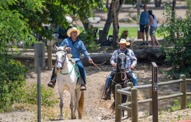 Two men ride their horses through O'Neill Regional Park in Trabuco Canyon in early June 2025. The park encompasses 4,500 acres in Trabuco and Live Oak Canyons and includes 23 miles of trails and a campground. (Photo by Mark Rightmire, Orange County Register/SCNG)