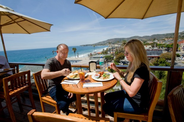 The Rooftop Lounge, atop La Casa del Camino Hotel in Laguna Beach, offers 360-degree panoramic views of both the ocean and the hills. (Photo by Paul Rodriguez, Orange County Register/SCNG)