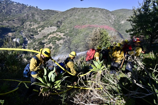 Firefighters battle the Rancho Fire in Laguna Beach, CA on July 7, 2025. ￼ (Photo by Jeff Gritchen, Orange County Register/SCNG)