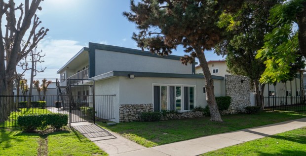 This seven-unit apartment property at 128 East Wakefield Ave. in Anaheim sold May 12 for $2,264,000 or $323,428 per unit. (Photo courtesy of Marcus & Millichap)