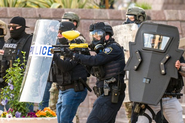 Federal police prepare to fire piper spray at anti-ICE protesters outside the Federal Building in downtown in Santa Ana on Monday, June 9, 2025. (Photo by Leonard Ortiz, Orange County Register/SCNG)