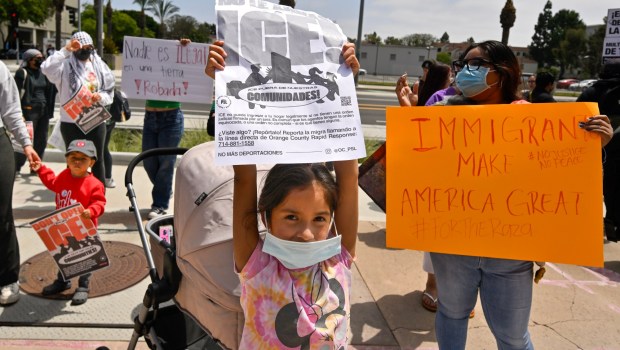 Protesters rally at the Federal Building while police stand guard in Santa Ana, CA, on Monday, June 9, 2025. About 200 anti-ICE protesters spent the afternoon carrying signs as they chanted and yelled at police. (Photo by Jeff Gritchen, Orange County Register/SCNG)