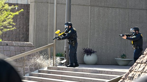 A water bottle is thrown by a protesters as they stand off against police at the Federal Building in Santa Ana, CA, on Monday, June 9, 2025. About 400 anti-ICE protesters spent the afternoon carrying signs as they chanted and yelled at police. (Photo by Jeff Gritchen, Orange County Register/SCNG)