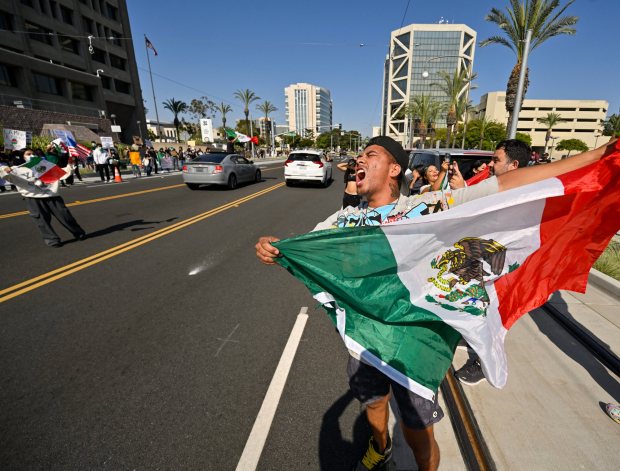 Protesters stand off against police at the Federal Building in Santa Ana, CA, on Monday, June 9, 2025. About 400 anti-ICE protesters spent the afternoon carrying signs as they chanted and yelled at police. (Photo by Jeff Gritchen, Orange County Register/SCNG)