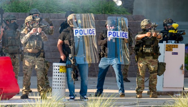 Federal police and members of the Special Response Team fire pepper balls at ICE protesters outside the Federal Building in downtown in Santa Ana on Monday, June 9, 2025. (Photo by Leonard Ortiz, Orange County Register/SCNG)