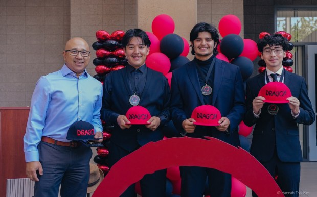 The Dragon Kim Fellowship is seeking mentors to guide high school students in the nonprofit's seven-month social entrepreneurship program. Seen here are mentor Allan Sanjongco, with Abraham Lopez, Lorenzo Ibarra and Gerardo Caravez, former Dragon Kim Foundation fellows. (Photo courtesy of Dragon Kim Foundation)