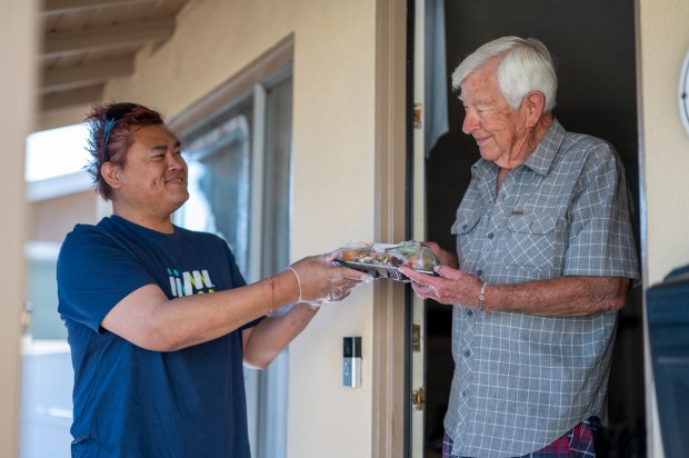 Meals on Wheels OC is seeking donations to help feed seniors at risk of food insecurity in the county. The nonprofit says one in four older adults in Orange County struggle with hunger. (Photo courtesy of Meals on Wheels)