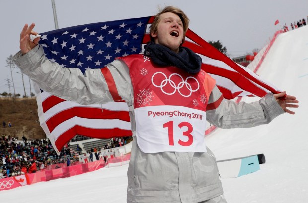 Kyle Mack, of the United States, celebrates after winning the silver medal in the men's Big Air snowboard competition at the 2018 Winter Olympics in Pyeongchang, South Korea, Saturday, Feb. 24, 2018. (AP Photo/Matthias Schrader)