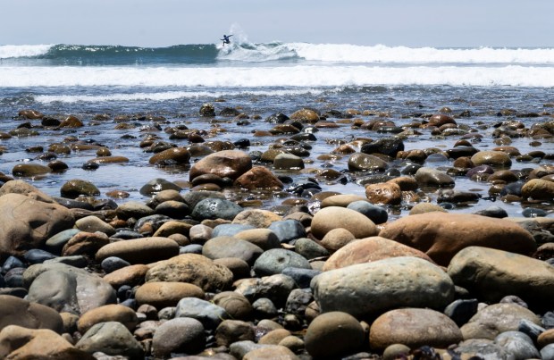 Cobblestones line the beach at the Trestles Pro south of San Clemente, CA on Tuesday, June 10, 2025. The event is part of the World Surf League tour. (Photo by Paul Bersebach, Orange County Register/SCNG)
