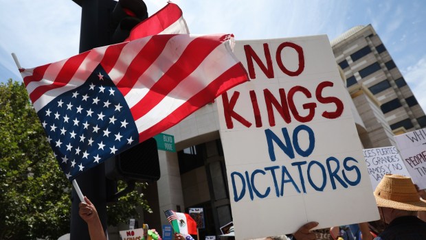 People gather in Pasadena along Colorado Boulevard for the "No Kings Day" protest against President Trump and his policies, on Saturday, June 14, 2025. More than 1,500 similar demonstrations were held nationwide. (Photo by Trevor Stamp, Contributing Photographer)