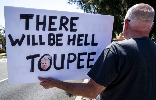 Hundreds of "No Kings Day" demonstrations against Trump-backed policies nationwide protest along Ontario Avenue in Corona on Saturday, June 14, 2025. (Photo by Terry Pierson, The Press-Enterprise/SCNG)