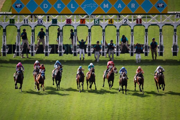 Horses break from the starting gate during the sixth race of Opening Day at the Del Mar Racetrack on Friday, July 18, 2025 in Del Mar, CA. (Meg McLaughlin / The San Diego Union-Tribune)