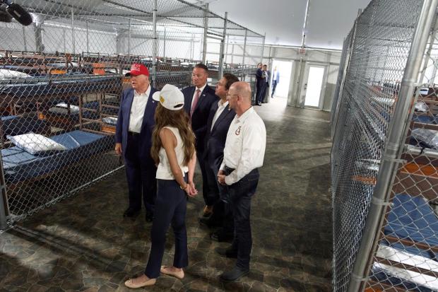 President Donald Trump speaks with reporters as he tours Alligator Alcatraz, a new migrant detention facility at Dade-Collier Training and Transition facility, on July 1, 2025, in Ochopee, Fla. (AP Photo/Evan Vucci)